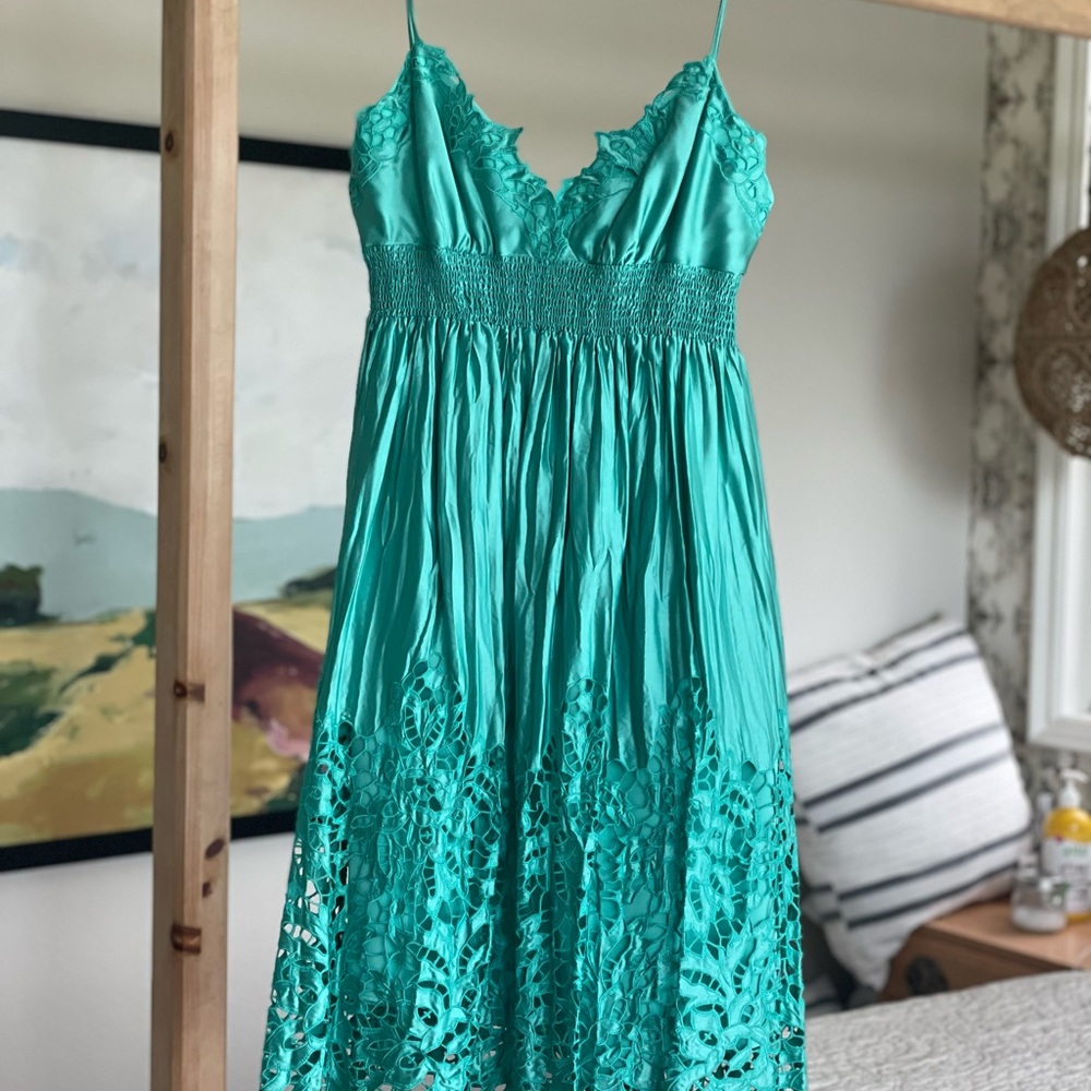 BCBGMaxAZRIA dress with cut-out detailing. Beautiful turquoise color. Size S